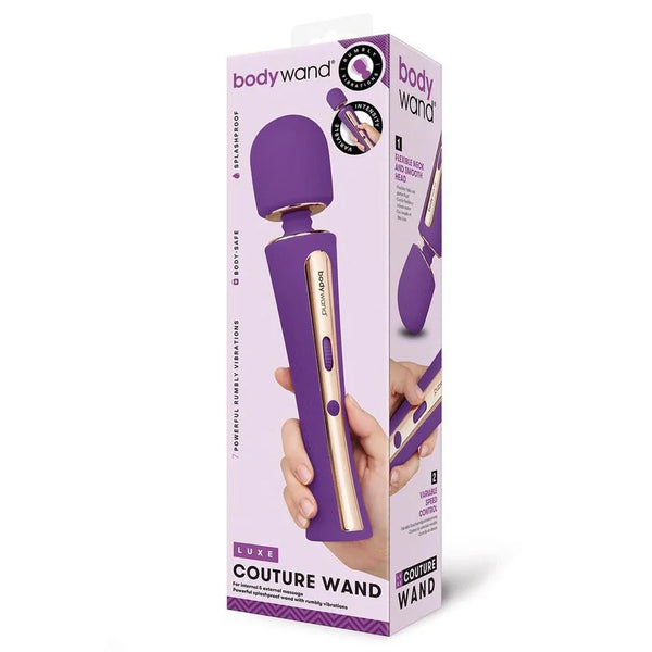 Bodywand Luxe Couture Wand in Purple beside its box showing the wand in hand