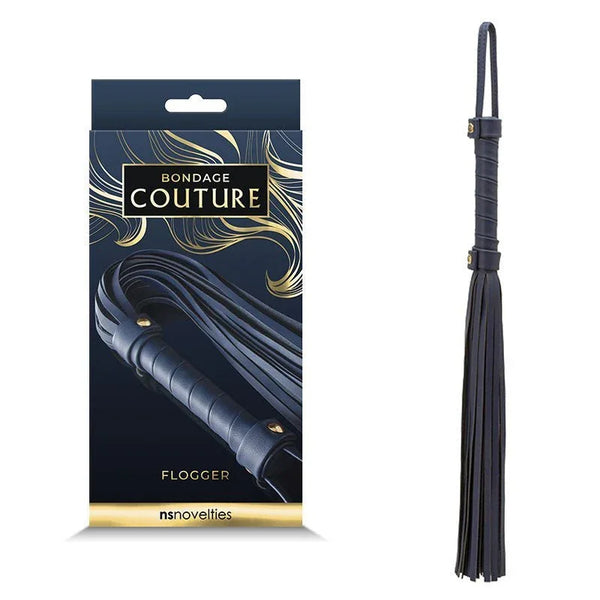 Bondage Couture flogger in Blue, navy faux-leather tails hanging beside its dark retail box
