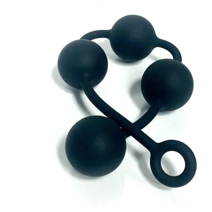 Boneyard Ass Ballz Large coiled in a knot, close-up of the matte silicone