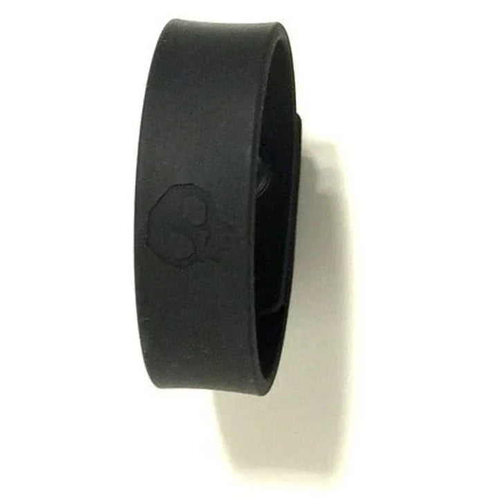 Boneyard Cock Strap snapped closed, side view with skull embossing