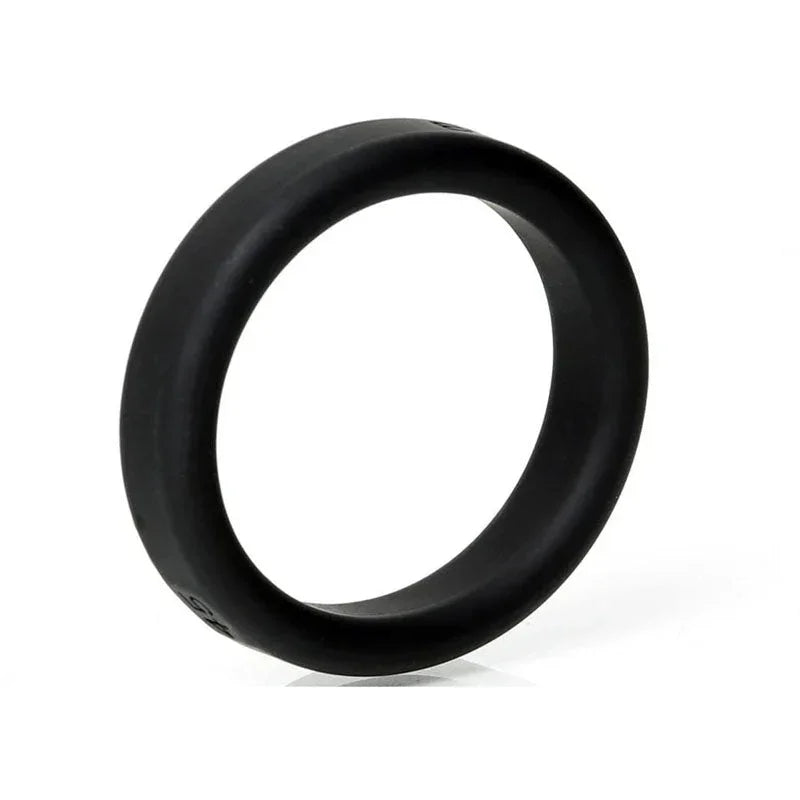Black silicone cock ring, smooth texture, body-safe material.