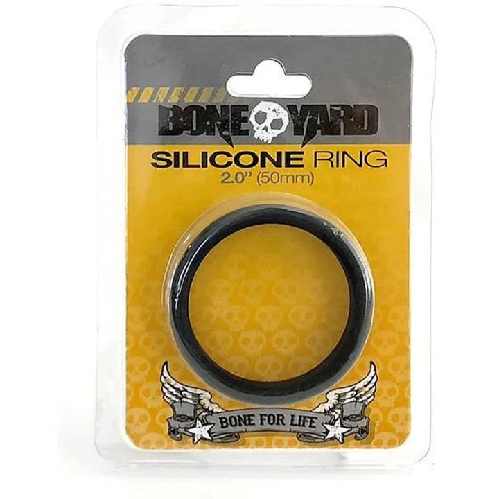 Boneyard Silicone Ring 50 mm in Black, sealed in its yellow blister card