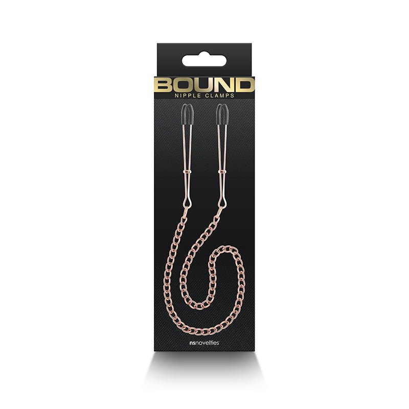 Buy Bound Nipple Clamps - DC3 - Rose Gold - Rose Gold Nipple Clamps with Chain – Naughtyhut NZ sex toys online. Discreet delivery & top brands.