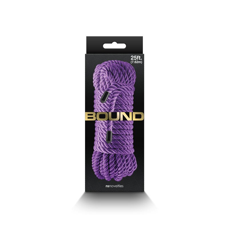 The image displays a black and gray box with gold text BOUND, containing 7.6m of non-chafing purple rope made from durable polyester fiber. The coil is branded as nsnovelties.