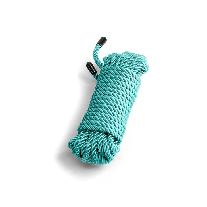 Bound bondage rope in Green, coiled hank on white showing the twisted strands