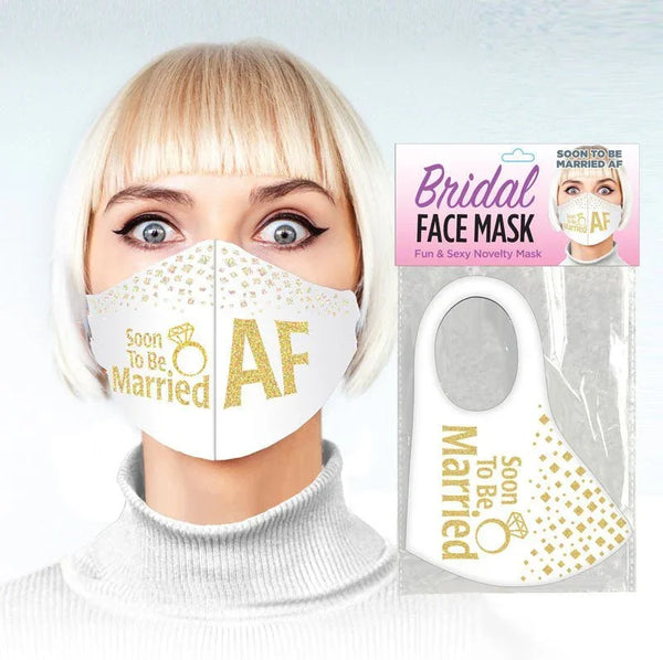 Soon To Be Married AF bridal face mask worn by a model, shown beside its pack