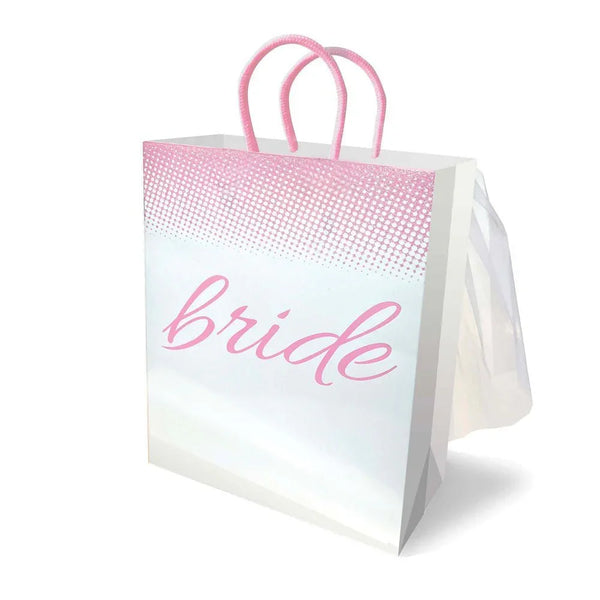 Bride novelty gift bag in white with pink script and dots, tulle veil tucked behind