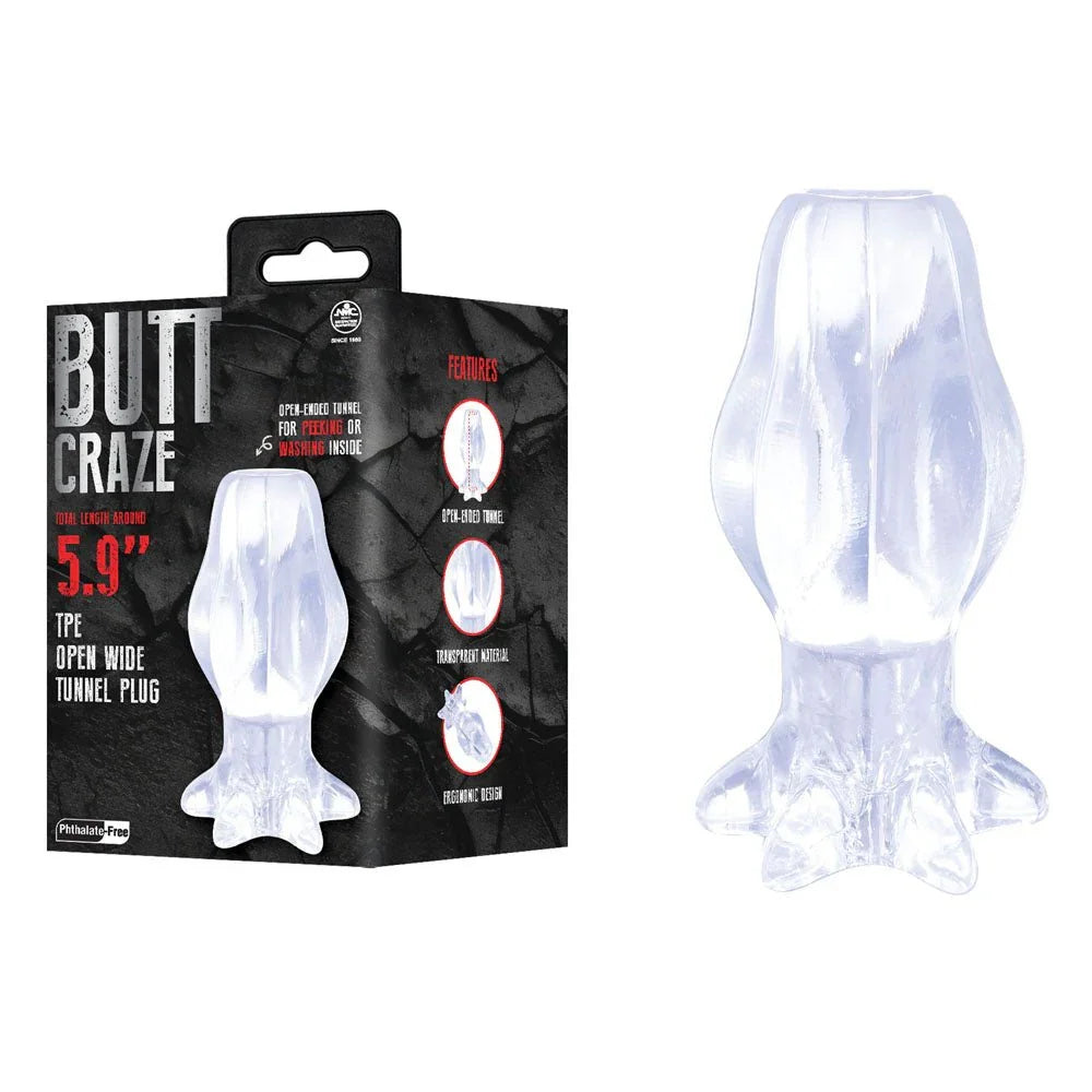 Butt Craze 15 cm hollow tunnel plug in Clear, closed petal tip, beside its black retail box