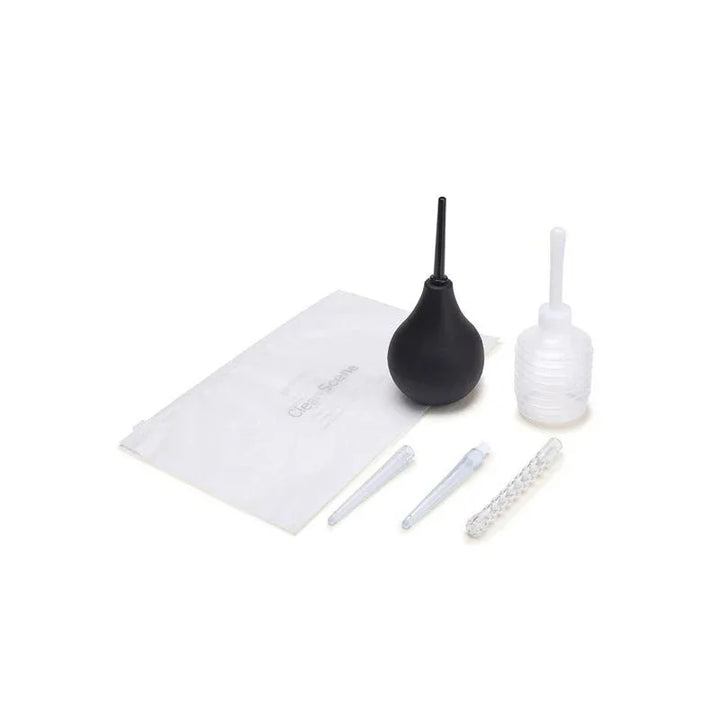 CleanScene 7 piece set laid out, black bulb, travel douche, three nozzles and bag