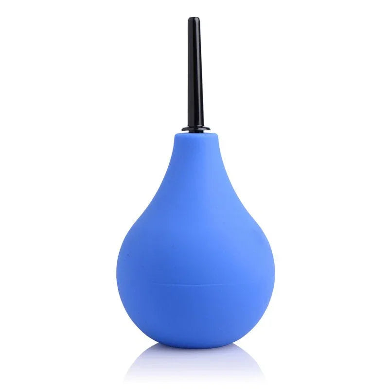 CleanStream anal douche bulb in Blue standing upright, black nozzle fitted