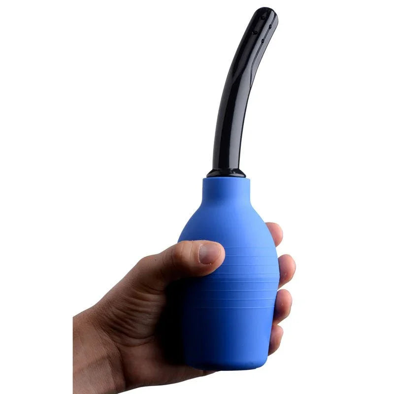 Blue silicone enema bulb with black nozzle, handheld design for personal use.