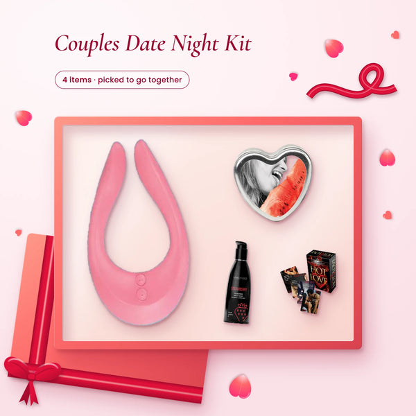 Couples Date Night Kit: a pink Satisfyer Endless Joy, watermelon massage candle, strawberry lube and cards on pink