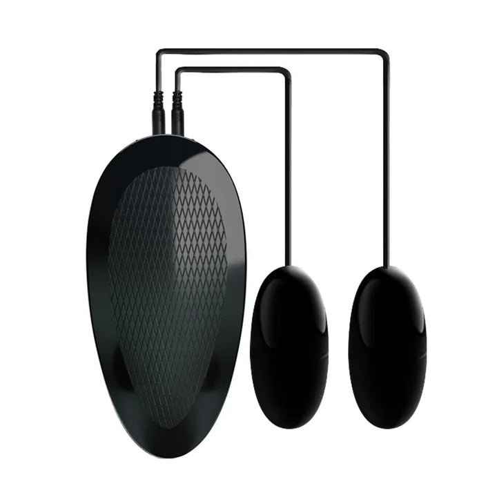 Twin black vibrating eggs wired to the teardrop remote