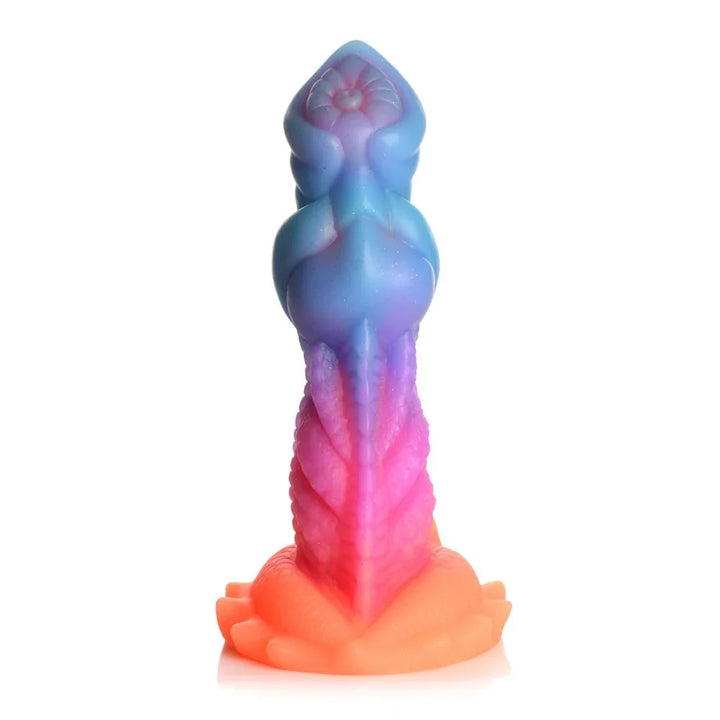 Aqua-Cock dildo standing on white, rear view of the ribbed spiral shaft