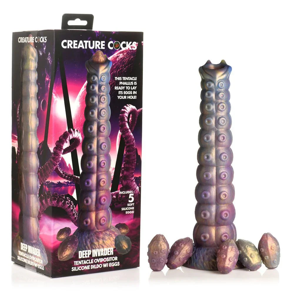 Creature Cocks Deep Invader ovipositor dildo and its five silicone eggs beside the retail box