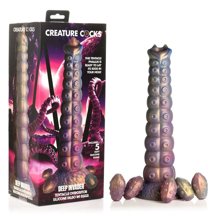 Creature Cocks Deep Invader ovipositor dildo and its five silicone eggs beside the retail box