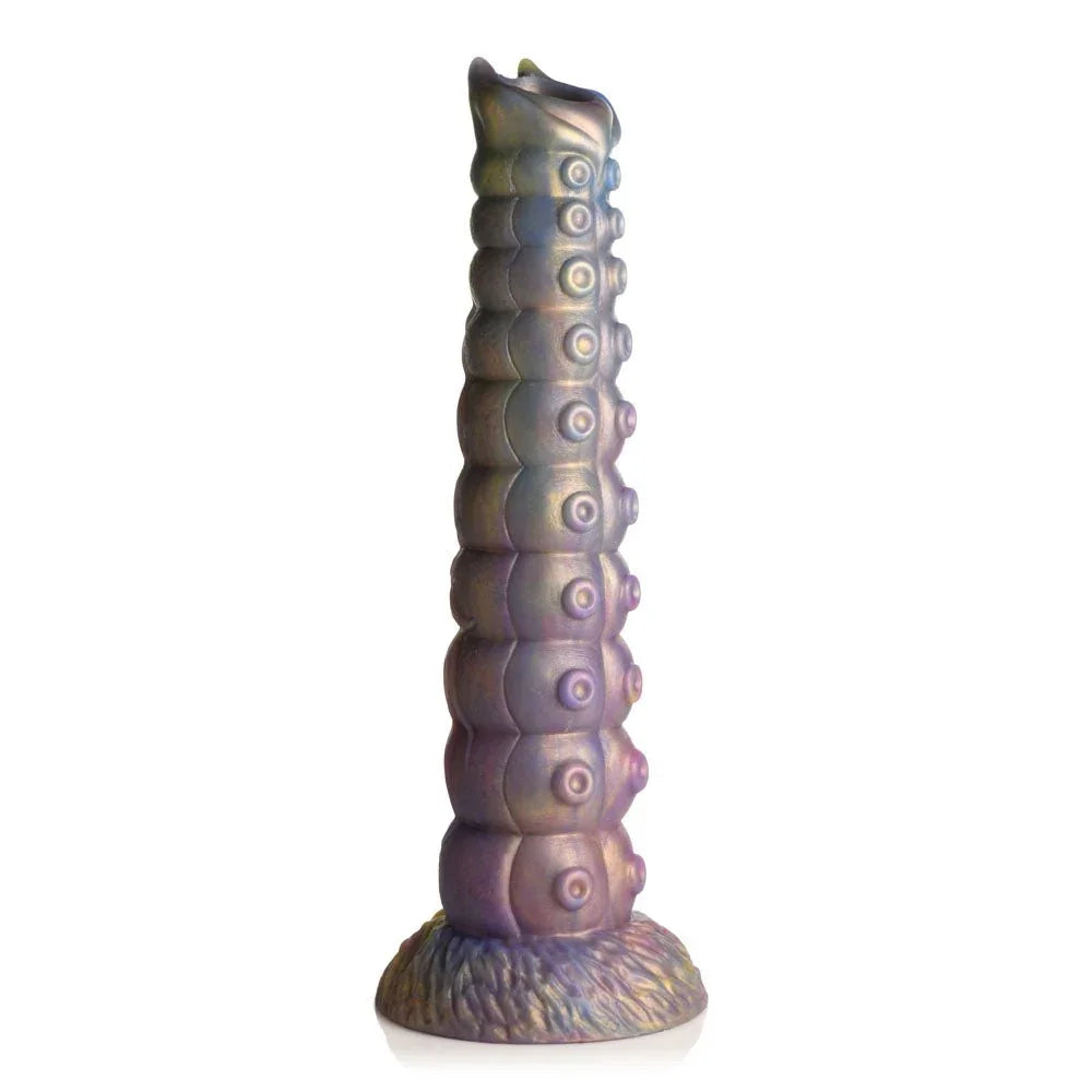 Deep Invader dildo standing alone on white, rows of tentacle suckers up the shaft