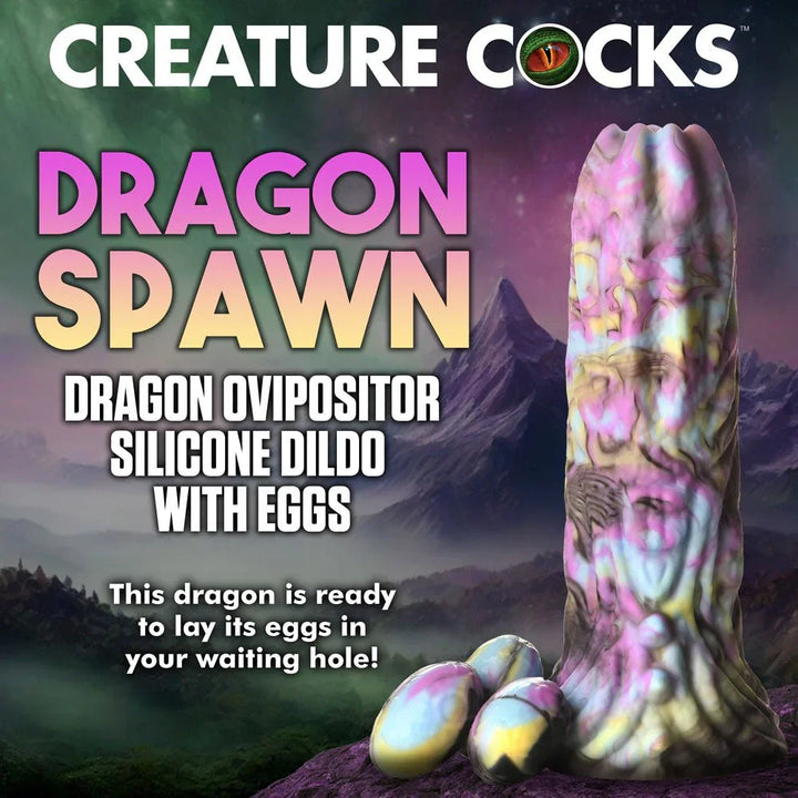 Dragon Spawn title panel, the mottled pink and yellow ovipositor dildo shown with eggs