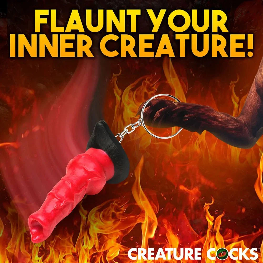 Hell Hound keychain panel headed Flaunt Your Inner Creature on a flame backdrop