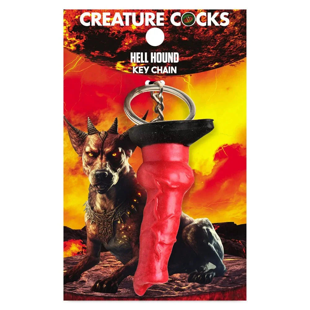 Creature Cocks Hell Hound keychain on its printed backer card