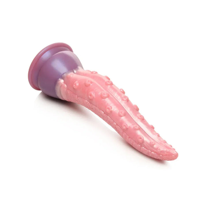 Octoprobe dildo lying flat on white, side profile with the purple suction cup at left