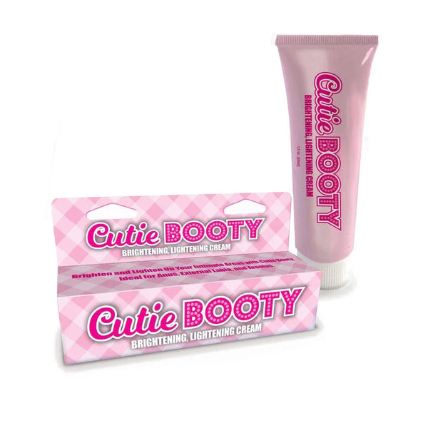 Cutie Booty brightening cream, pink checked cartons with the tube standing behind
