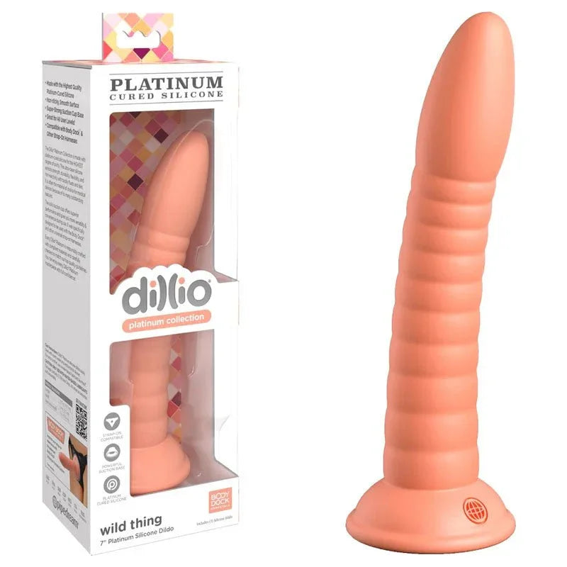 Pipedream Dillio Platinum Wild Thing 7 inch dildo in Peach, ribbed shaft, next to its box