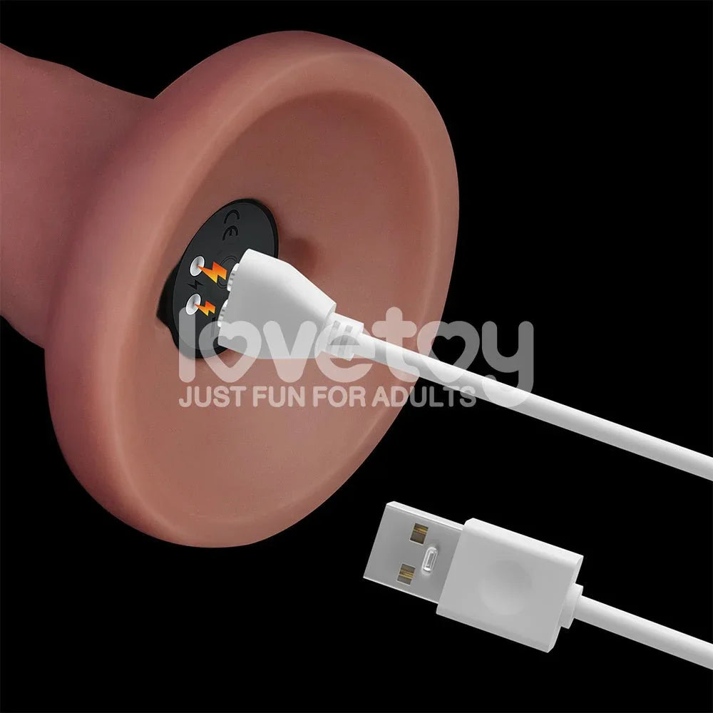 White magnetic USB charger connected to the base of the 8 inch Dual Density Power Cock