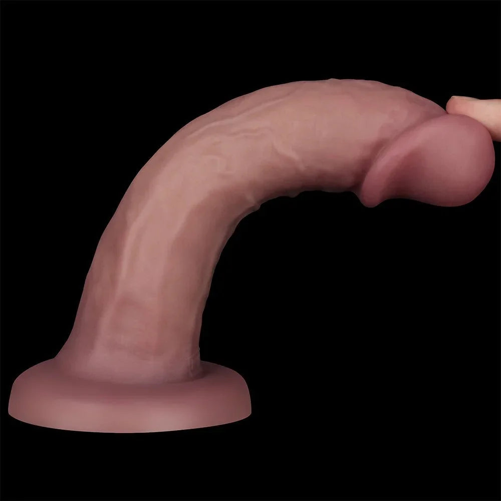 Dual Density Power Cock 8 inch arched forward on its suction cup, showing shaft flexibility