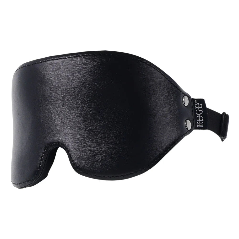 Close-up of the blindfold's curved leather panel and nose notch