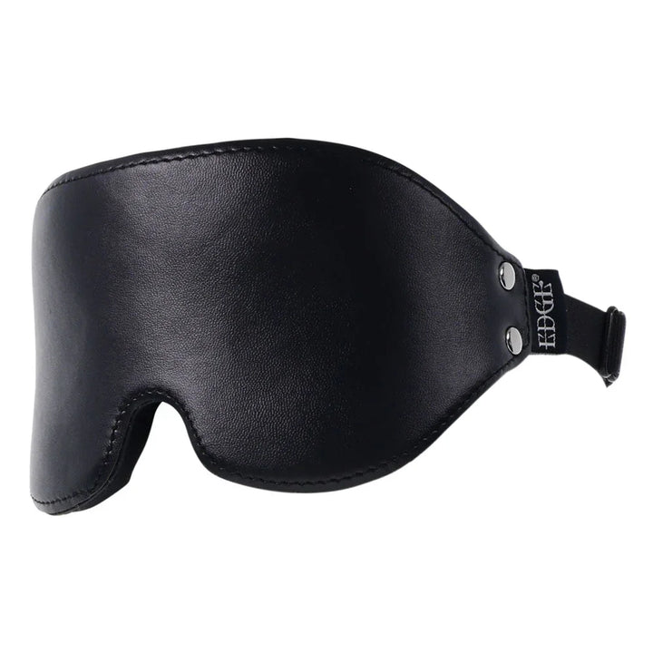 Close-up of the blindfold's curved leather panel and nose notch