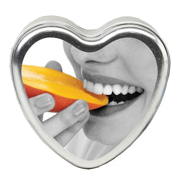 Earthly Body Edible Heart Candle in Tropical Mango, tin lid art of a bitten mango slice