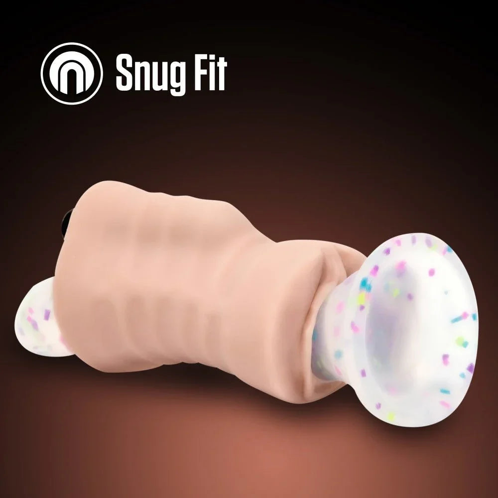 Destini stroker with the confetti suction cap fitted, snug fit feature panel