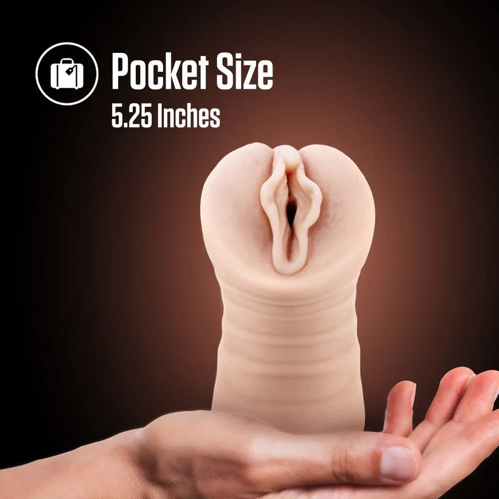 Destini stroker held on an open palm, pocket size feature panel at 5.25 inches
