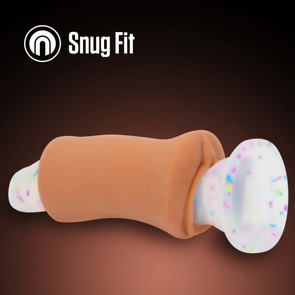 Molly stroker in tan with the confetti suction cap fitted, snug fit feature panel