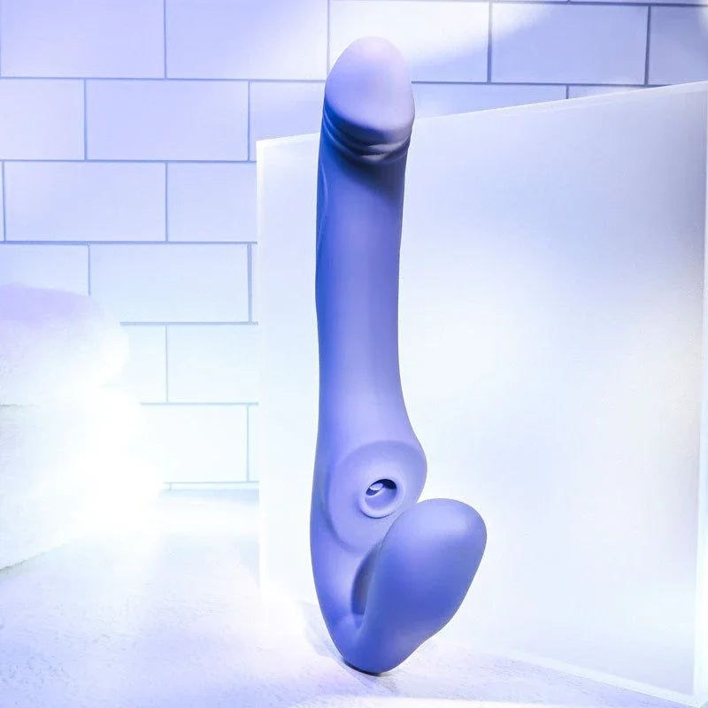 Evolved 2 Become 1 in Purple standing upright against a frosted panel in a tiled bathroom set