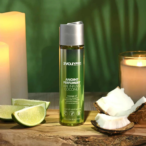 Evolved Anoint Perfumery Lime Infused Coconut oil, green bottle upright with lime wedge and coconut