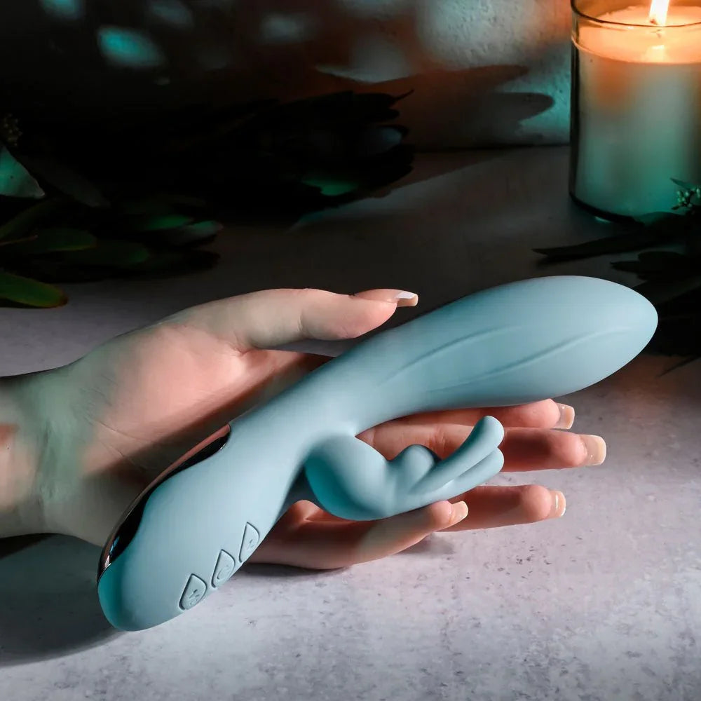 Evolved Boss Bunny in Baby Blue held across an open hand for scale