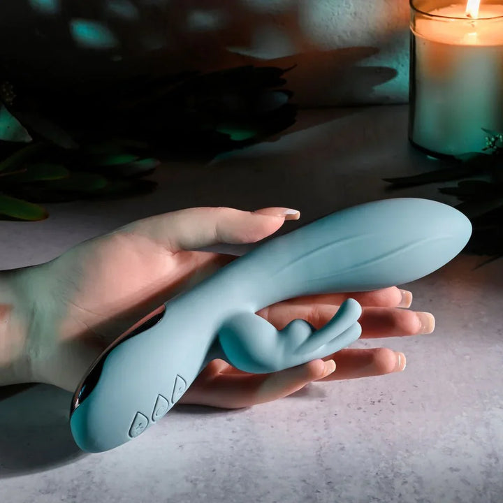 Evolved Boss Bunny in Baby Blue held across an open hand for scale