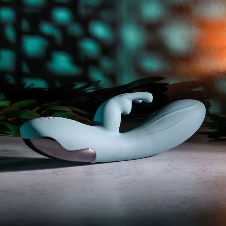 Evolved Boss Bunny in Baby Blue lying flat, side view with the ears pointing up