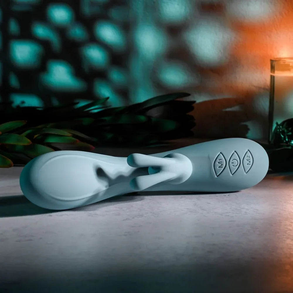 Evolved Boss Bunny in Baby Blue lying flat, close on the three control buttons in the handle