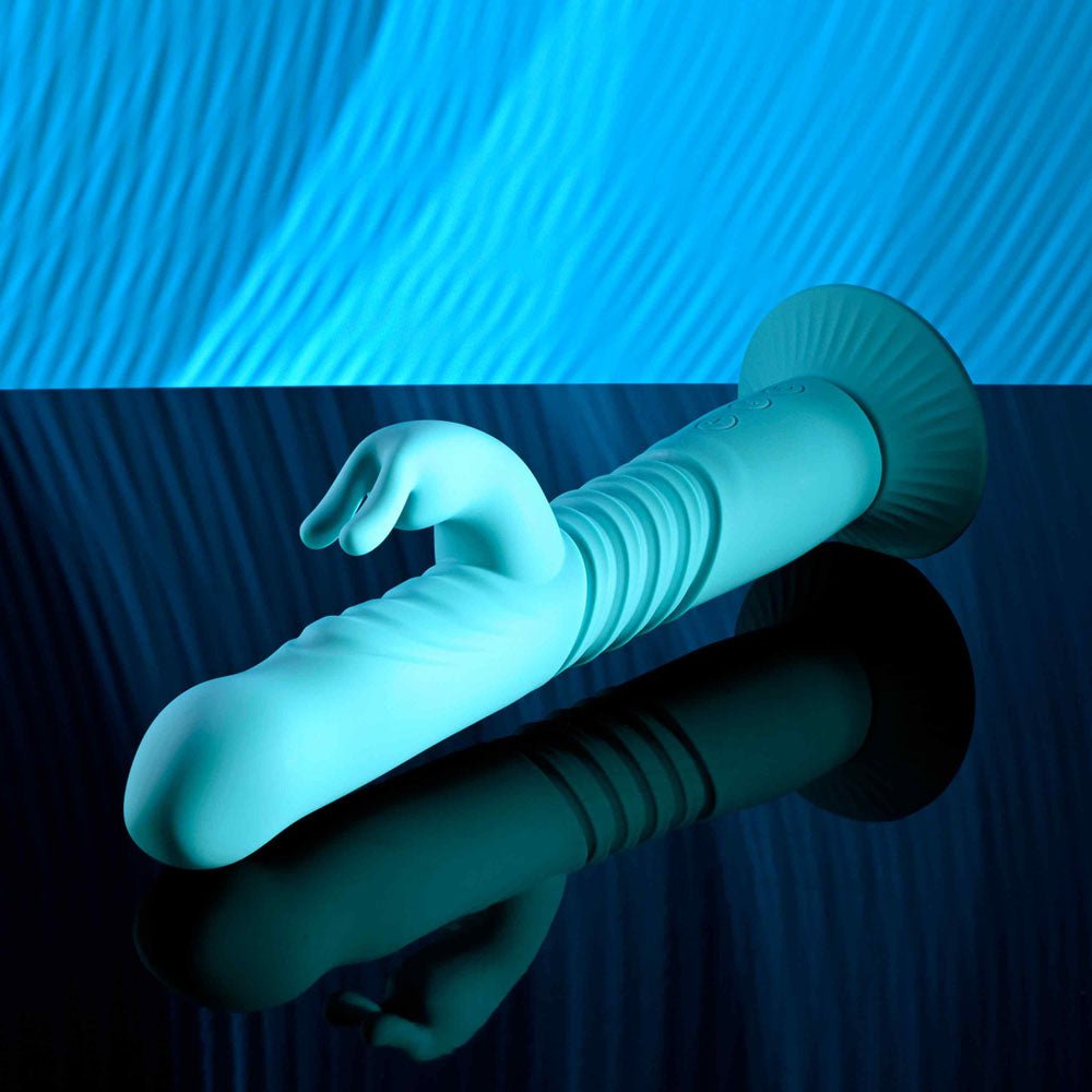 Evolved BUNNY HOP - Teal 25.1 cm USB Rechargeable Thrusting Rabbit Vibrator with Suction Base – Sex toys NZ by Naughtyhut. Discreet delivery nationwide.