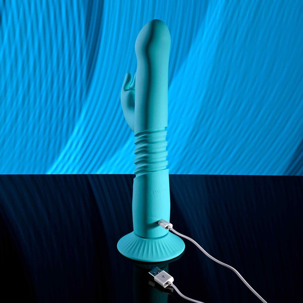 Evolved BUNNY HOP - Teal 25.1 cm USB Rechargeable Thrusting Rabbit Vibrator with Suction Base – Sex toys NZ by Naughtyhut. Discreet delivery nationwide.