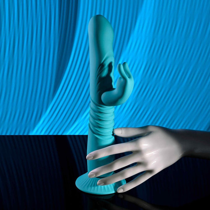 Evolved BUNNY HOP - Teal 25.1 cm USB Rechargeable Thrusting Rabbit Vibrator with Suction Base – Sex toys NZ by Naughtyhut. Discreet delivery nationwide.