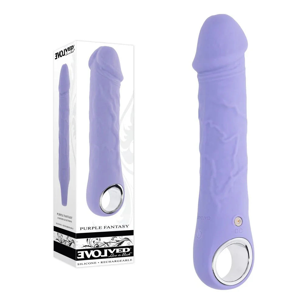 Evolved Purple Fantasy retail box beside the lilac realistic vibrator with chrome ring handle