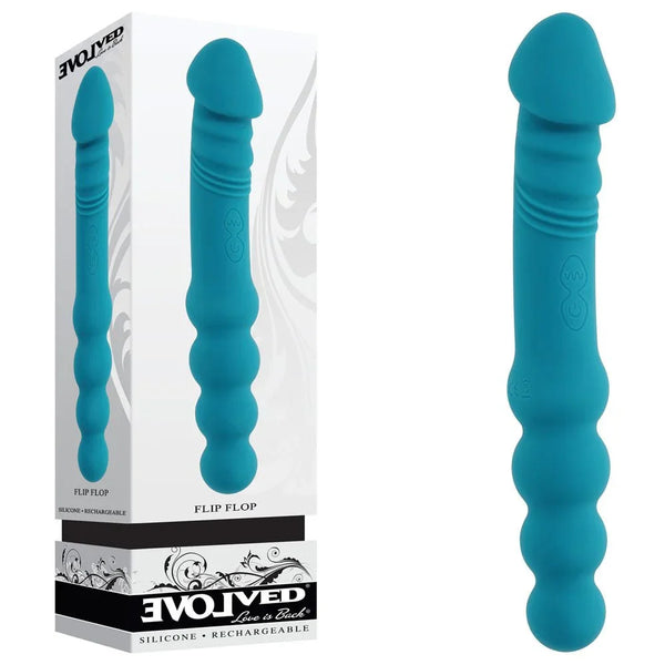Evolved Flip Flop retail box beside the teal dual-ended vibrator, ribbed end and beaded end