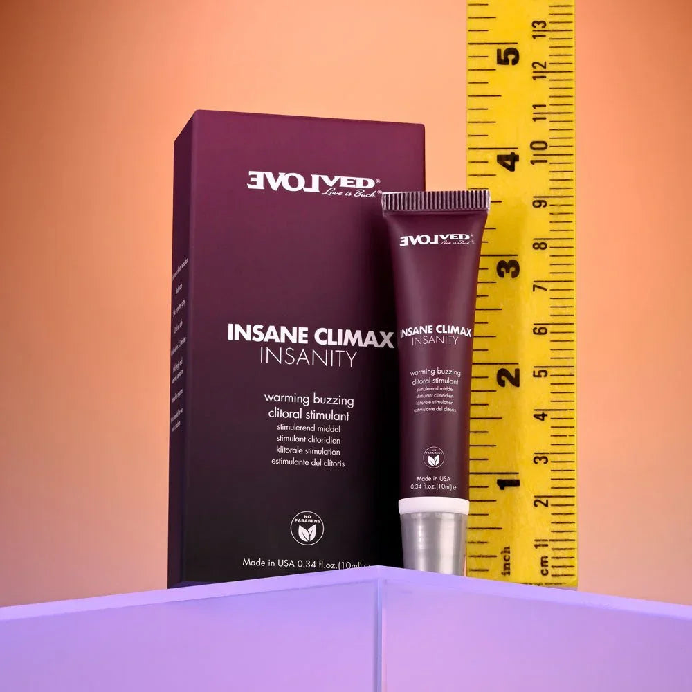 Evolved Insane Climax Insanity carton and tube beside a tape measure, carton about 4.5 inches tall