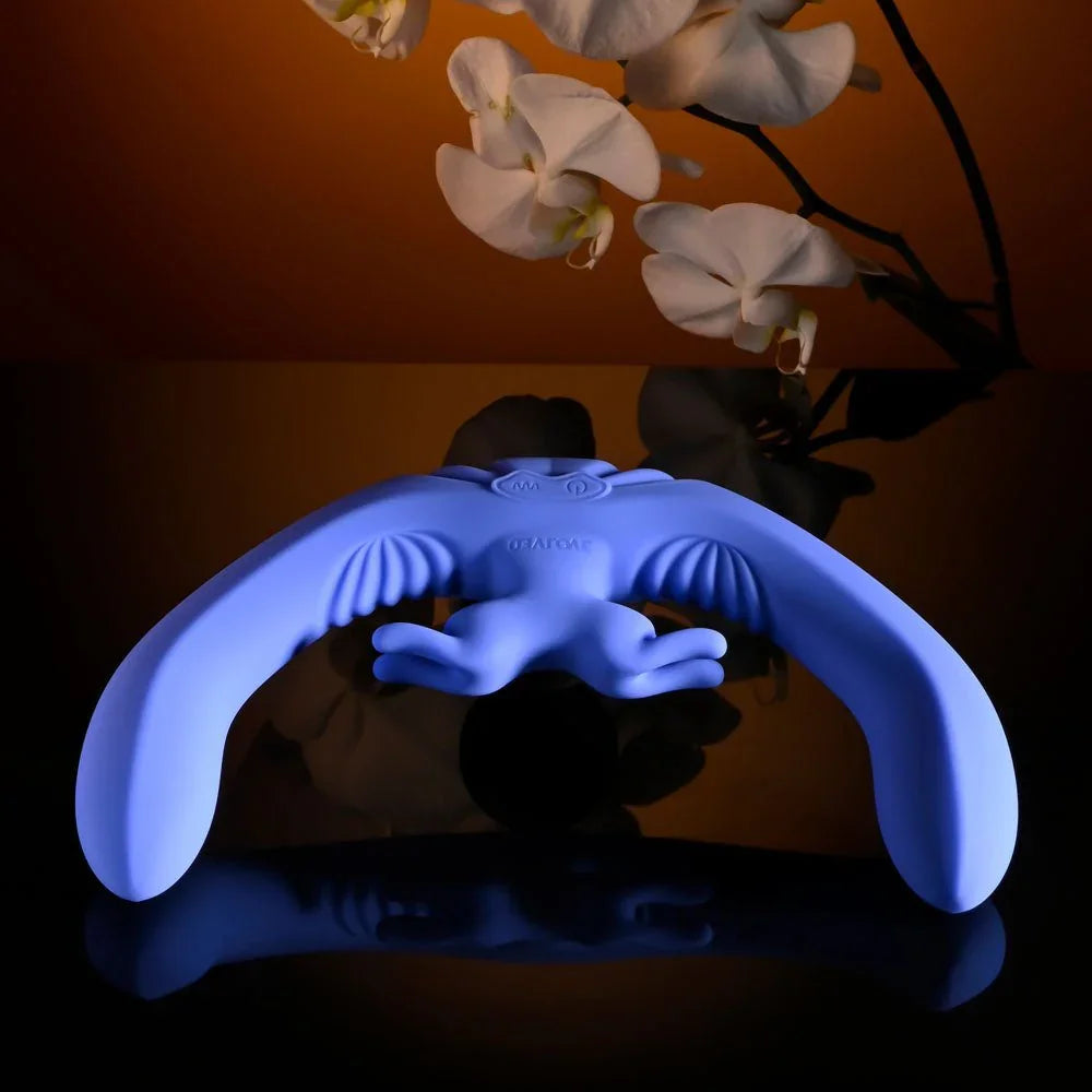 Evolved Lovebirds in periwinkle laid low on a reflective surface, side profile of both ends