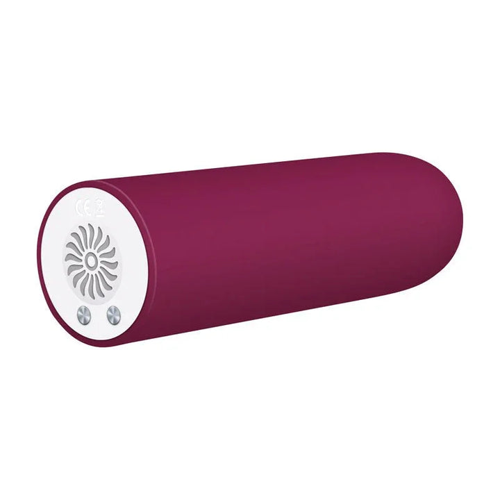Evolved Mighty Thick bullet in Burgundy Red on its side, showing the white base and charging pins