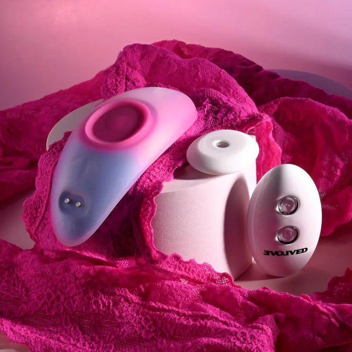 Evolved Paradise Panty in Pink/Purple on pink lace knickers with the magnet disc and remote alongside